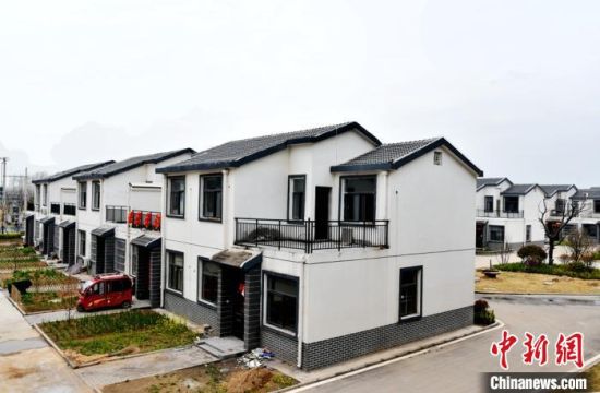 陈井村第一批160余户村民已经入住别墅式新民居。 朱志庚 摄 陈井村第一批160余户村民已经入住别墅式新民居。 朱志庚 摄